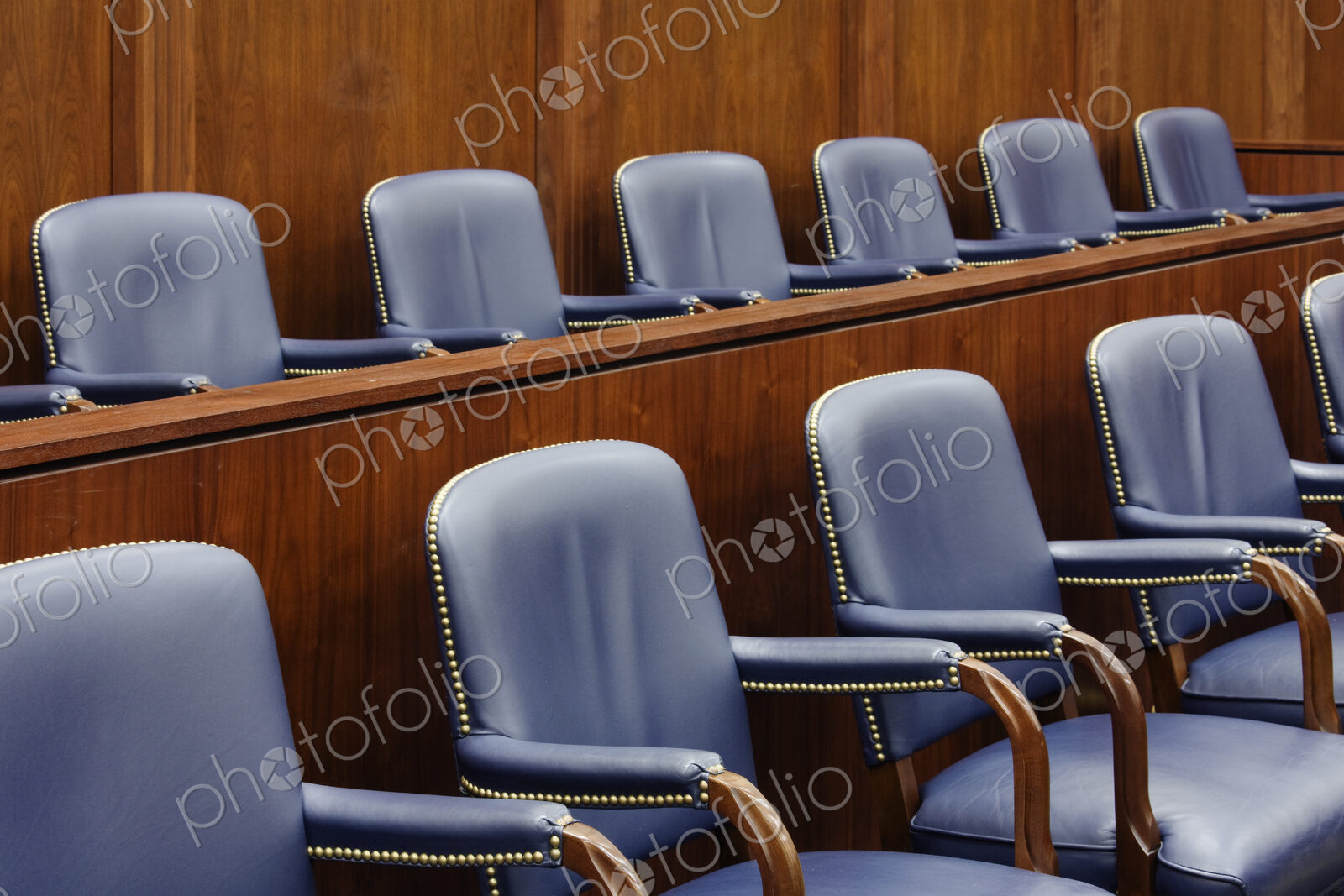 Empty Jury Seats in Courtroom