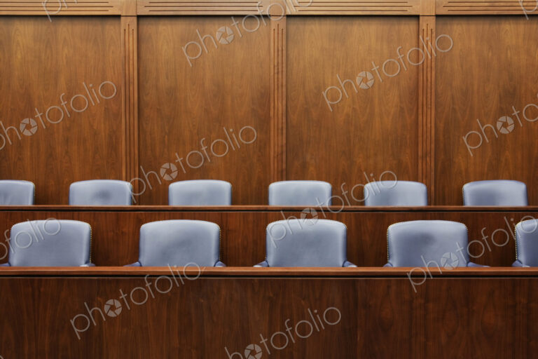 Empty Jury Seats in Courtroom