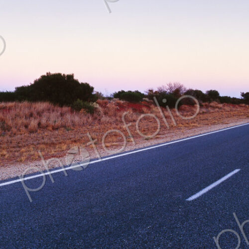 Empty Two Lane Highway at Dawn Empty Two Lane Highway at Dawn