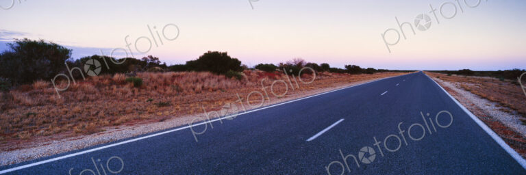 Empty Two Lane Highway at Dawn