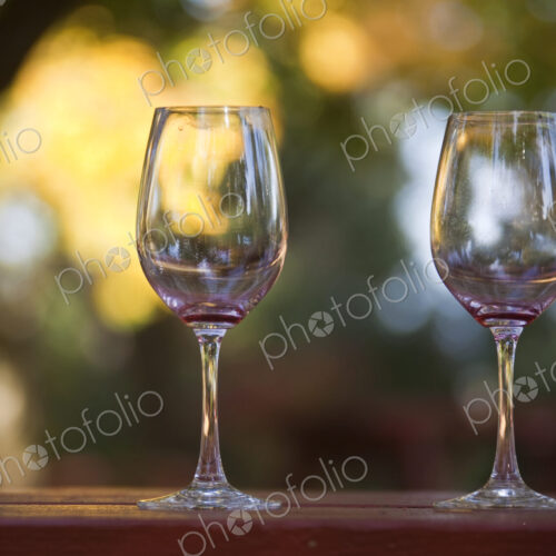Empty Wine Glasses on Patio Table Empty Wine Glasses on Patio Table
