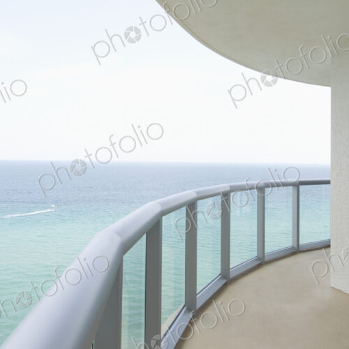 Empty balcony overlooking ocean Empty balcony overlooking ocean