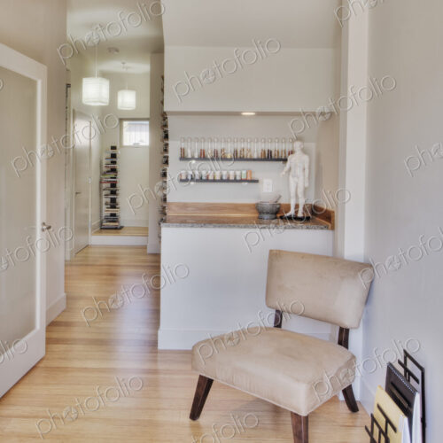 Empty chair in natural healing clinic waiting room