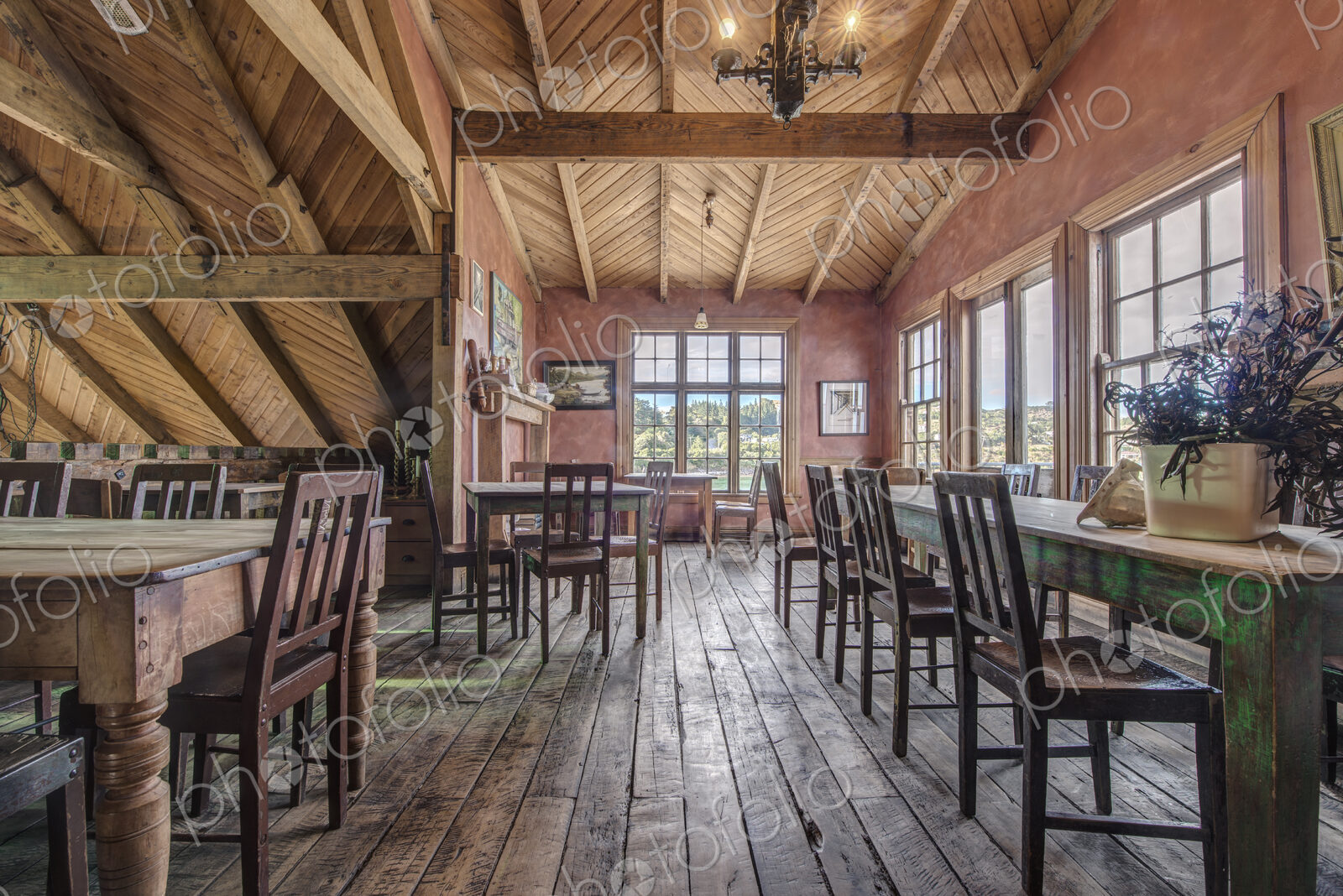 Empty chairs and tables in restaurant