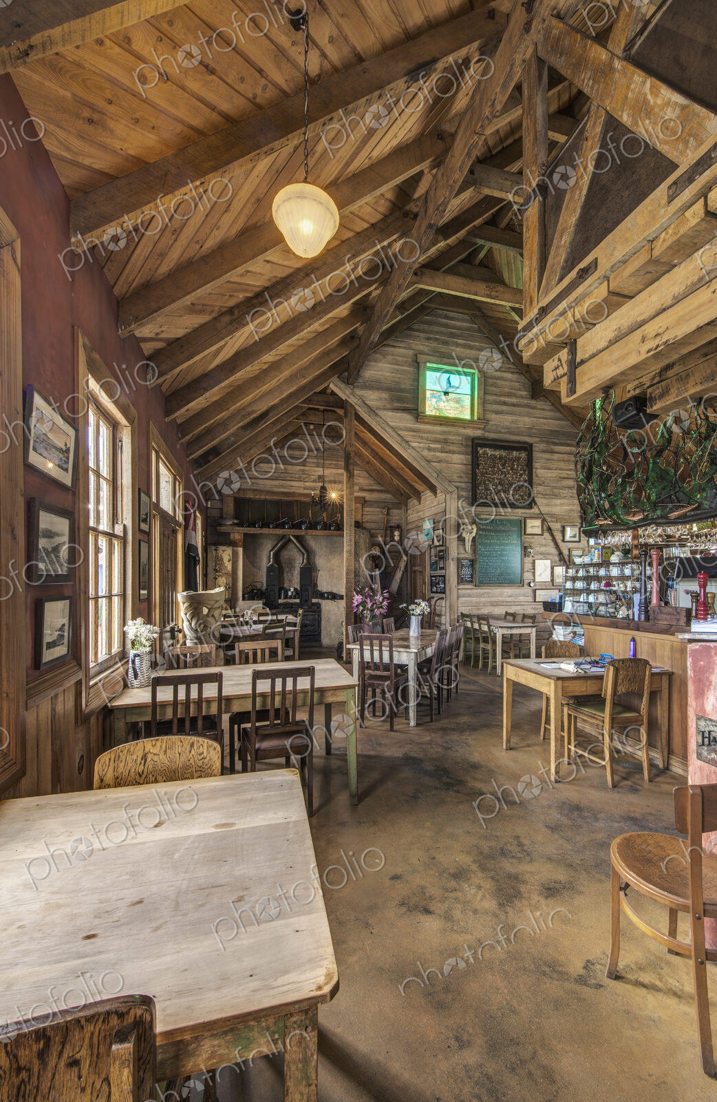 Empty chairs and tables in restaurant