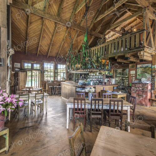 Empty chairs and tables in restaurant Empty chairs and tables in restaurant