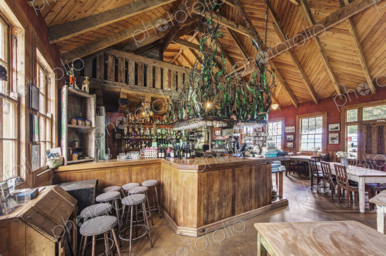 Empty chairs and tables in restaurant