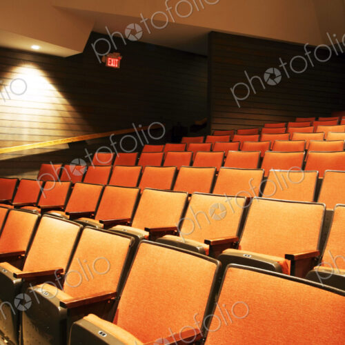Empty chairs in movie theater Empty chairs in movie theater