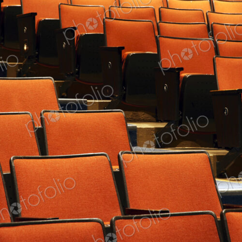Empty chairs in movie theater Empty chairs in movie theater