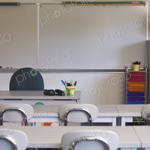 Empty desks in classroom Empty desks in classroom