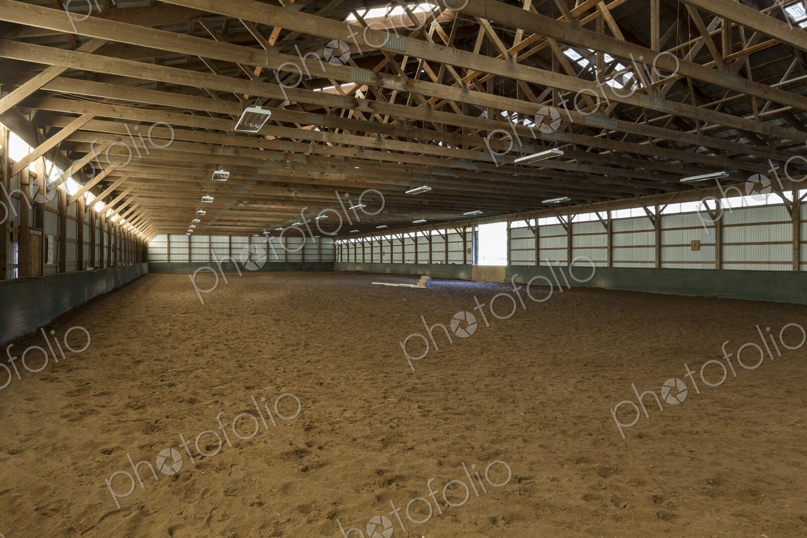 Empty indoor horse riding ring