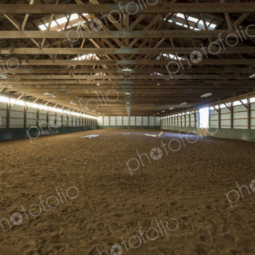 Empty indoor horse riding ring Empty indoor horse riding ring