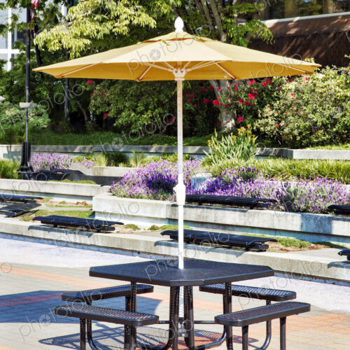 Empty picnic table in courtyard Empty picnic table in courtyard