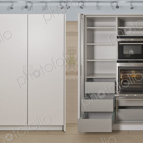 Empty refrigerator and cabinet storage in modern kitchen