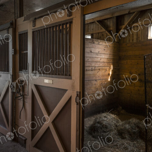 Empty stables in barn