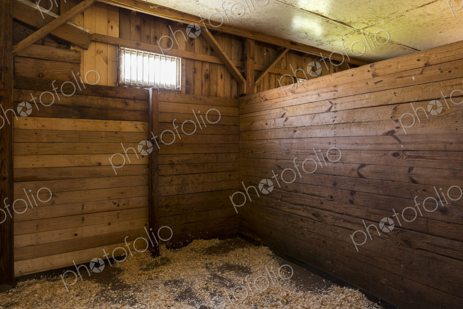 Empty stall in horse stable