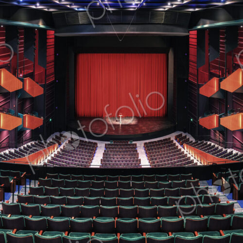 Empty theatre auditorium, stage with a red curtain, boxes and modern design. Empty theatre auditorium, stage with a red curtain, boxes and modern design.