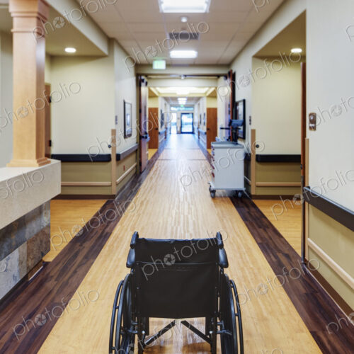 Empty wheelchair in assisted living facility Empty wheelchair in assisted living facility