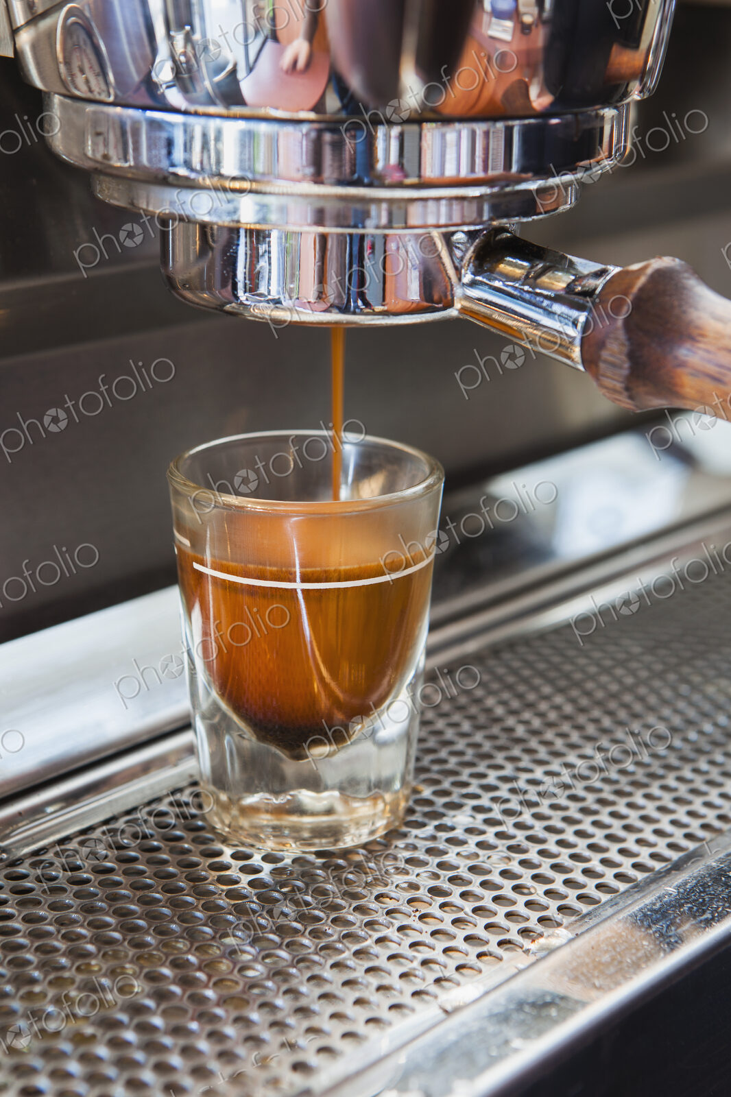 Espresso shot being poured from espresso machine, Seattle