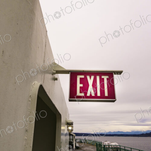Exit sign by door entry on Puget Sound ferry, Edmonds, WA, USA Exit sign by door entry on Puget Sound ferry, Edmonds, WA, USA