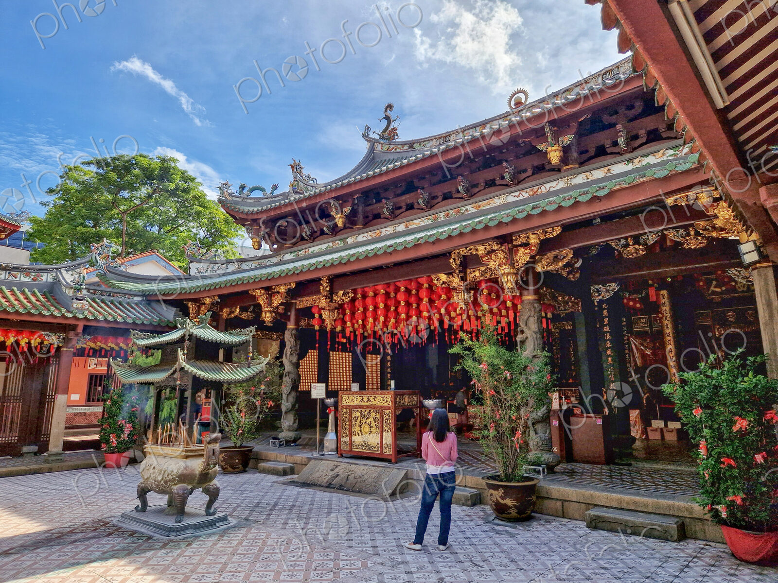 Exterior view of Thian Hock Keng temple in Singapore, traditional architecture and…