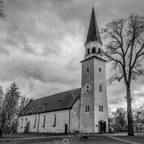 Exterior view of a church in Riga, a tall spire. Exterior view of a church in Riga, a tall spire.