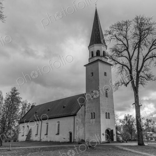 Exterior view of a church in Riga with a tall tower. Exterior view of a church in Riga with a tall tower.