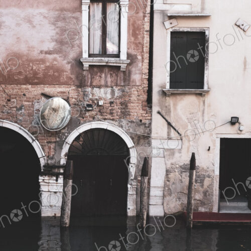 Exterior view of a neglected building on the Canale Grande in Venice, Veneto, Italy. Exterior view of a neglected building on the Canale Grande in Venice, Veneto, Italy.