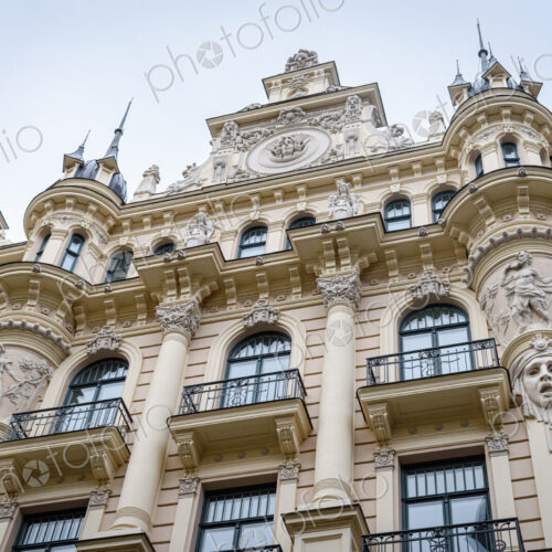 Exterior view of historic buildings in Riga, a low angle view, architectural landmarks. Exterior view of historic buildings in Riga, a low angle view, architectural landmarks.