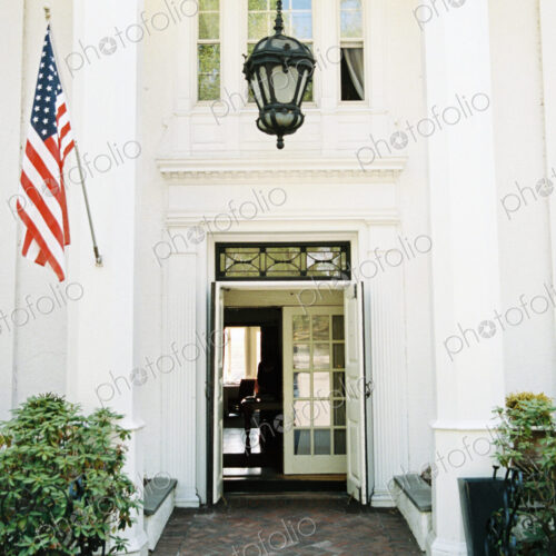 Exterior view of hotel and restaurant, A large entrance and portico. Exterior view of hotel and restaurant, A large entrance and portico.