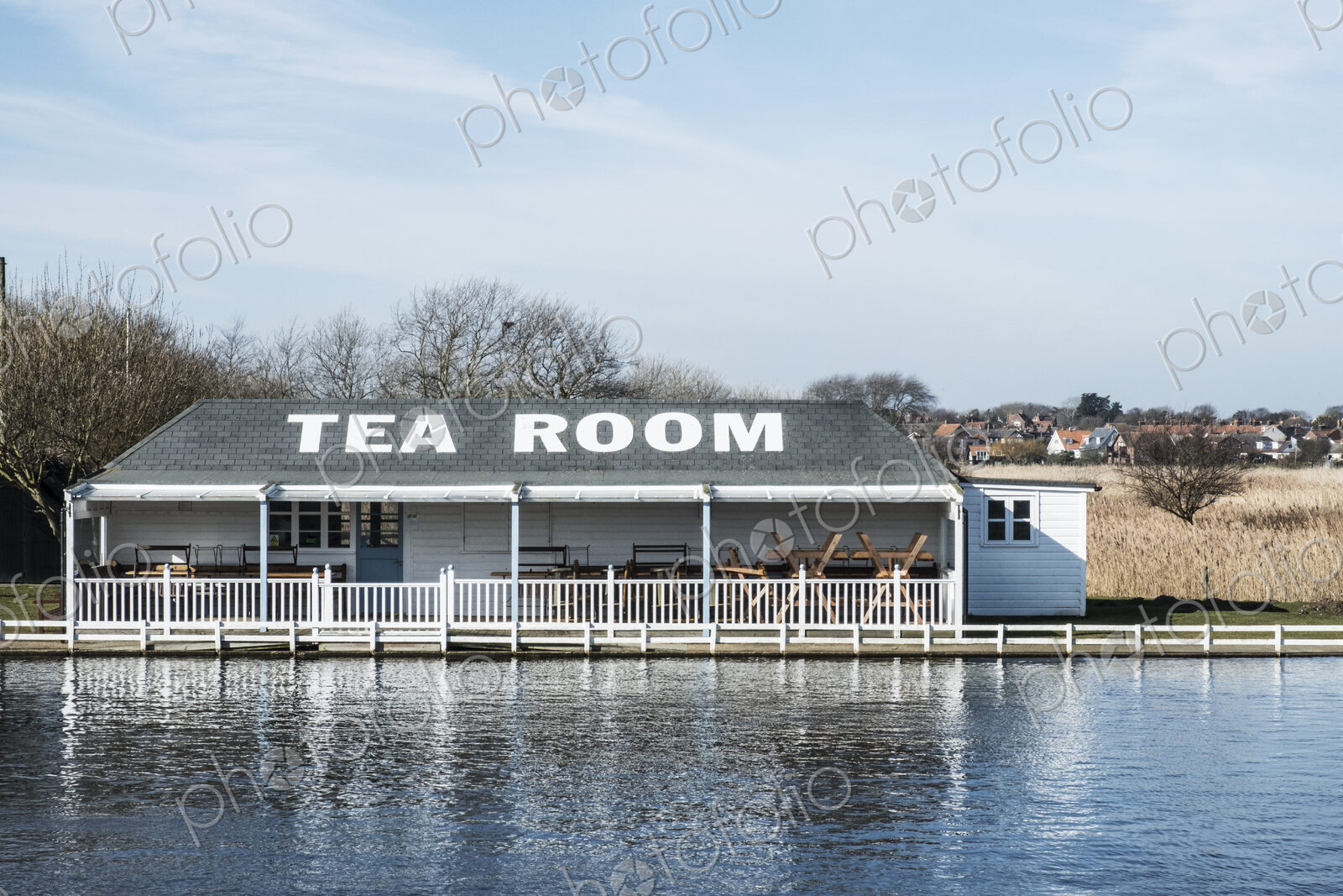 Exterior view of tea room on the shore of a lake.