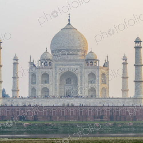 Exterior view of the Taj Mahal palace and mauseleum, with decorated exterior inlaid…