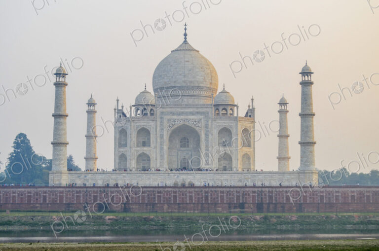 Exterior view of the Taj Mahal palace and mauseleum, with decorated exterior inlaid…