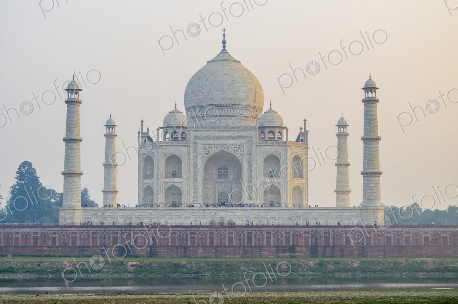 Exterior view of the Taj Mahal palace and mauseleum, with decorated exterior inlaid…