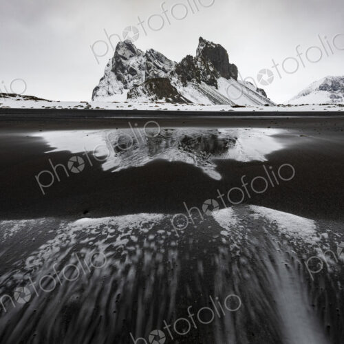 Eystrahorn mountain peak on the Hvalnes Peninsula, view from a meltwater lake,… Eystrahorn mountain peak on the Hvalnes Peninsula, view from a meltwater lake,…