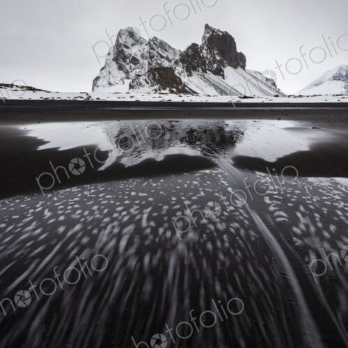 Eystrahorn mountain peak on the Hvalnes Peninsula, view from a meltwater lake,… Eystrahorn mountain peak on the Hvalnes Peninsula, view from a meltwater lake,…