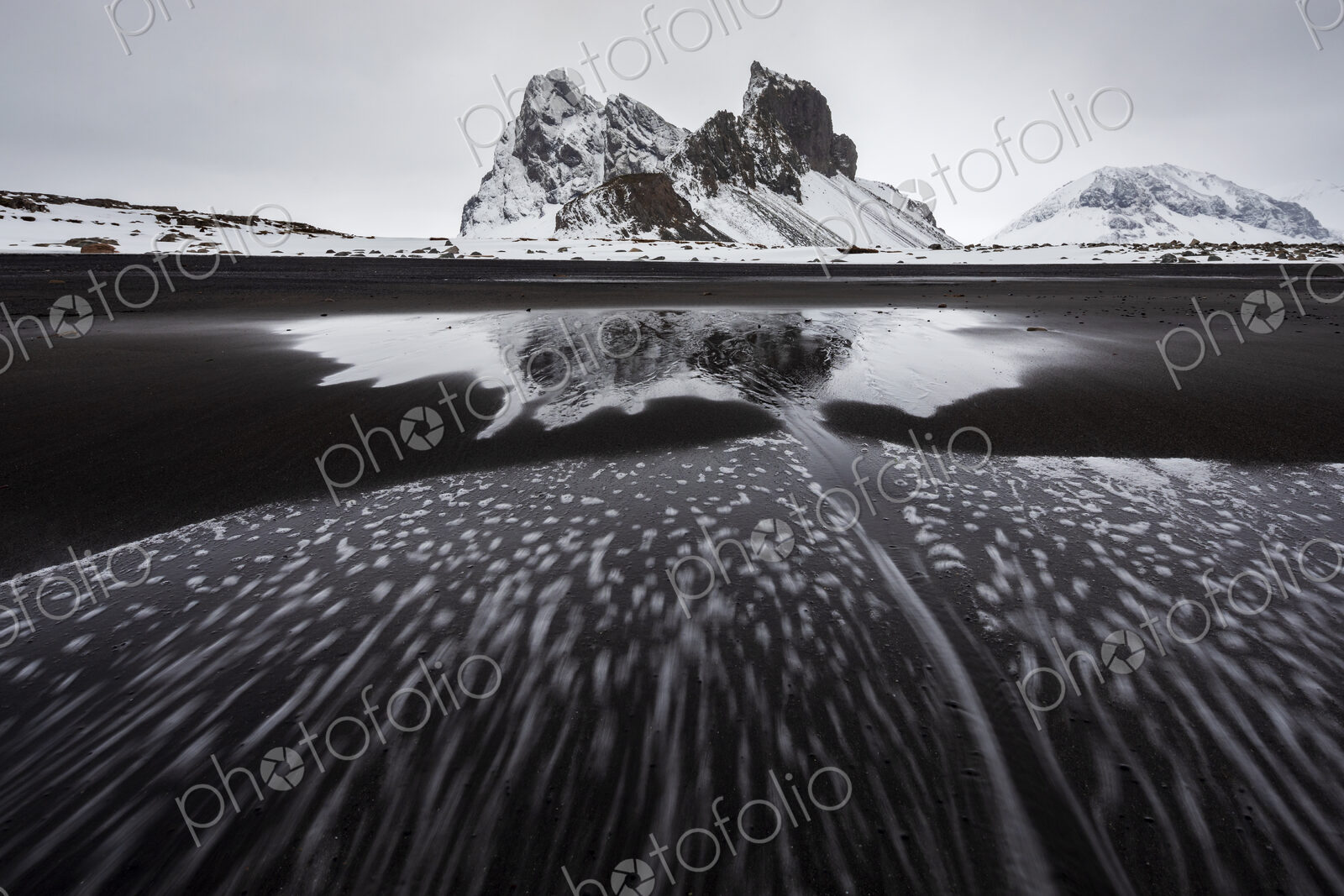 Eystrahorn mountain peak on the Hvalnes Peninsula, view from a meltwater lake,…