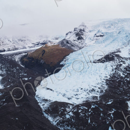 Falljökull Glacier, elevated view of the glacier flowing out of the vast Vatnajökull… Falljökull Glacier, elevated view of the glacier flowing out of the vast Vatnajökull…