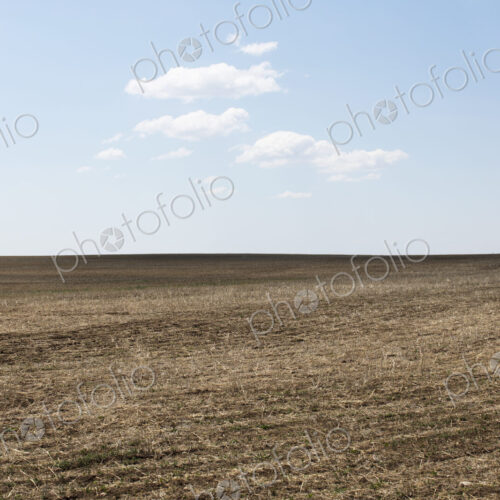 Fallow farmland, horizon and sky, near Dollard, Saskatchewan, Canada. Fallow farmland, horizon and sky, near Dollard, Saskatchewan, Canada.