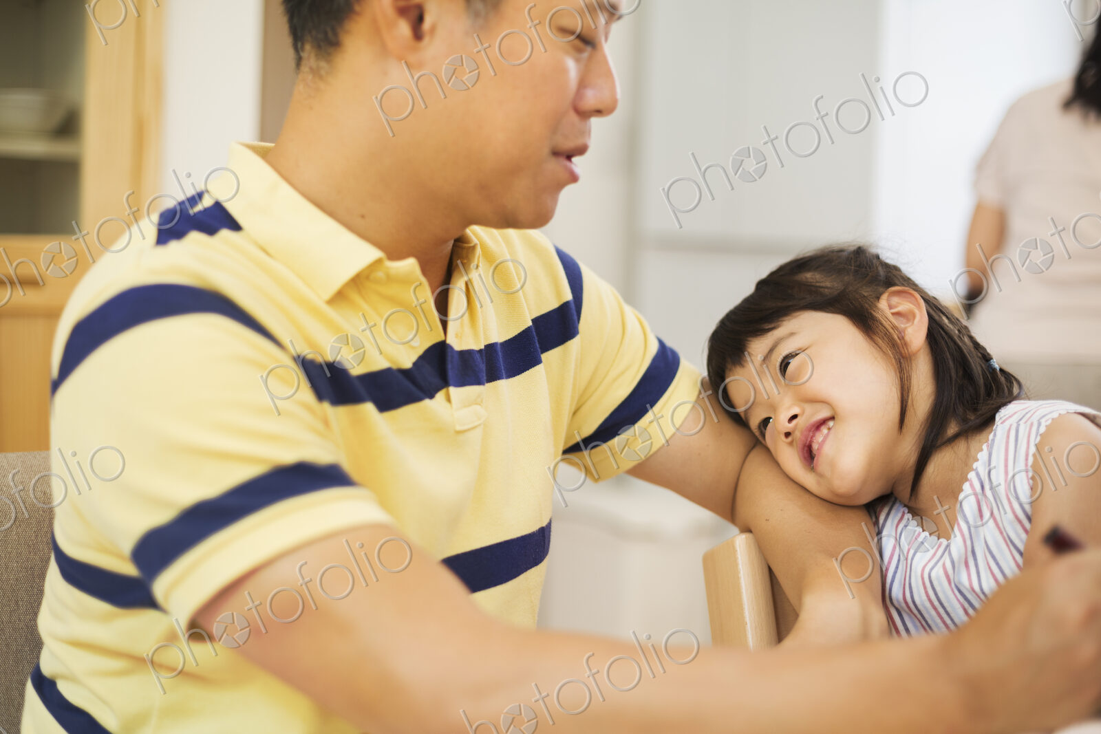 Family home. A man and his daughter.