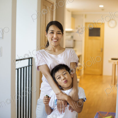 Family home. A woman and a young girl at home. Family home. A woman and a young girl at home.