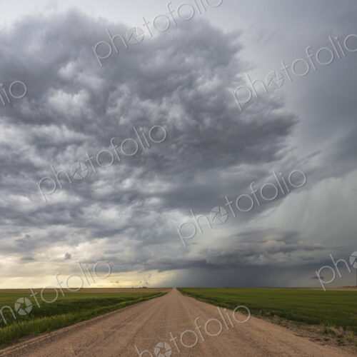 Farm Road and Developing Supercell clouds on the horizon.