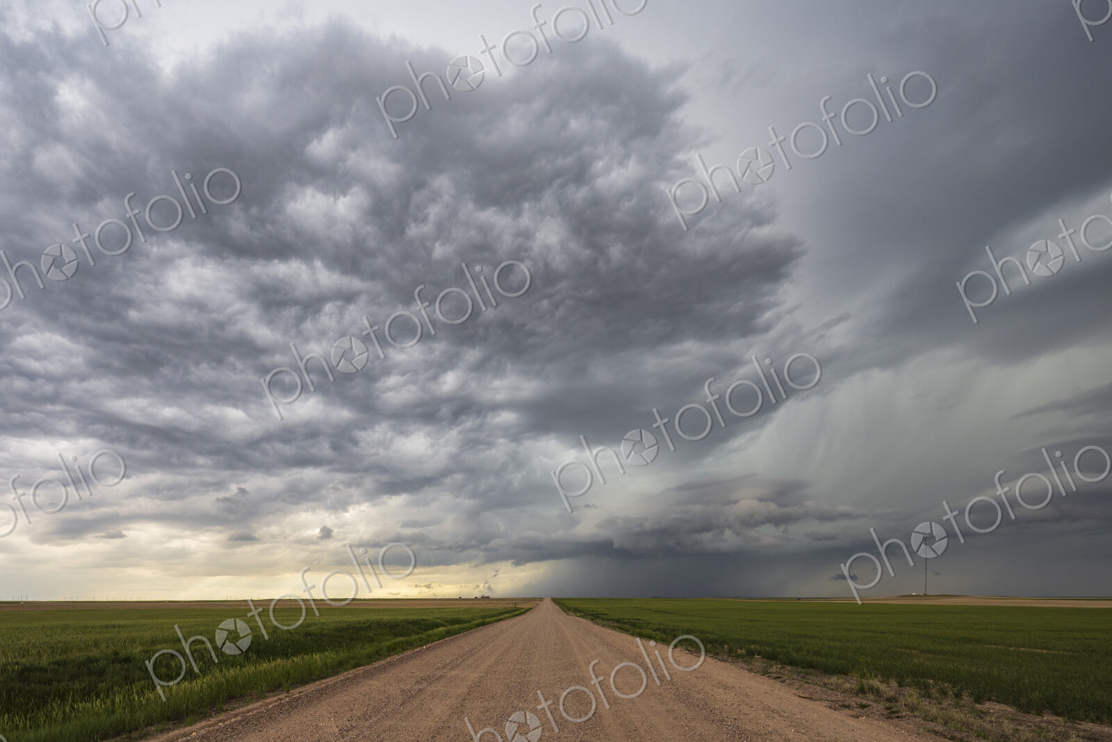 Farm Road and Developing Supercell clouds on the horizon.