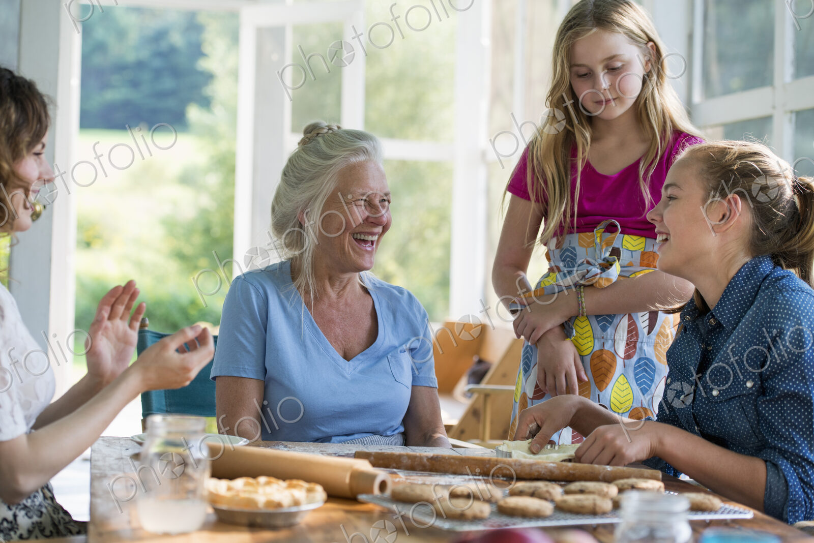 Farmhouse in the country in New York State. Four generations of women in a family…