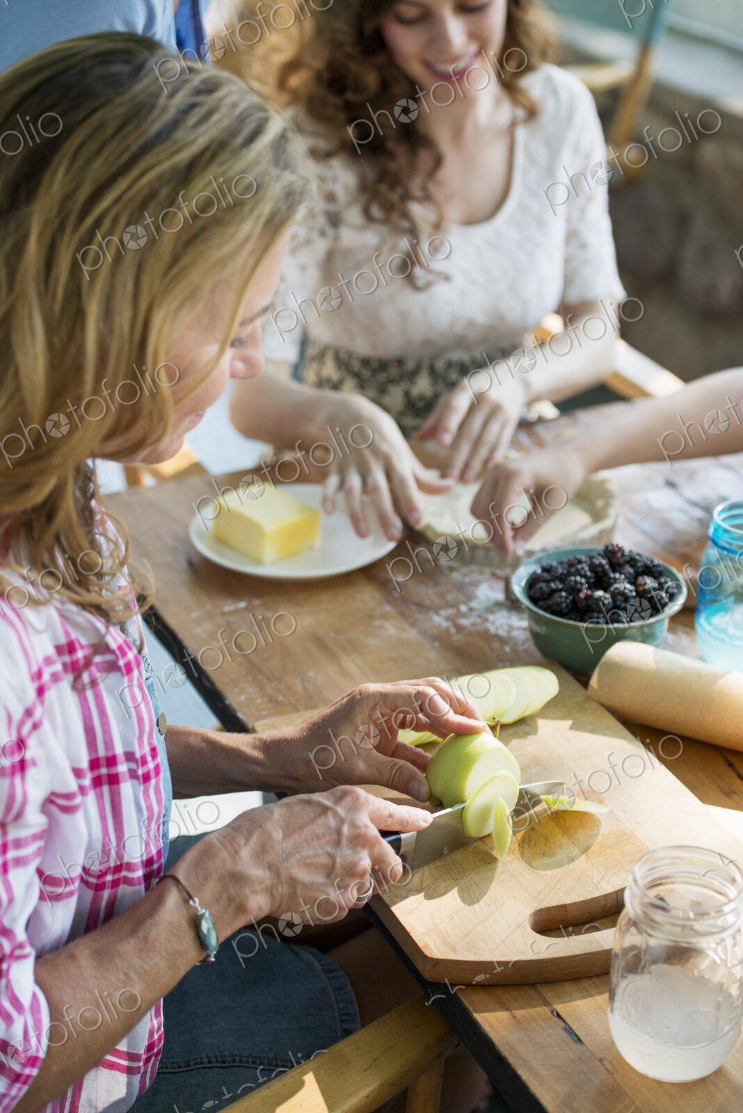 Farmhouse in the country in New York State. Four generations of women in a family…