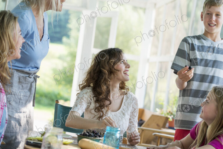 Farmhouse in the country in New York State. Four generations of women in a family…