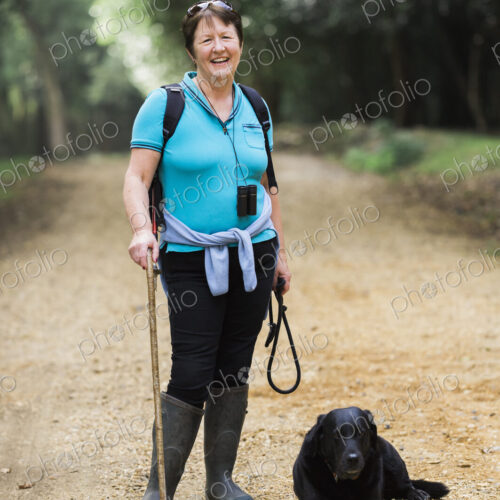 Female hiker with her dog.