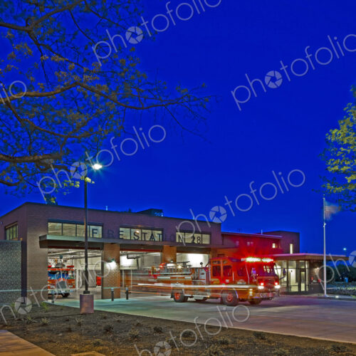 Fire Engine Leaving a Station at Night Fire Engine Leaving a Station at Night