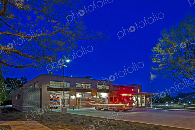 Fire Engine Leaving a Station at Night