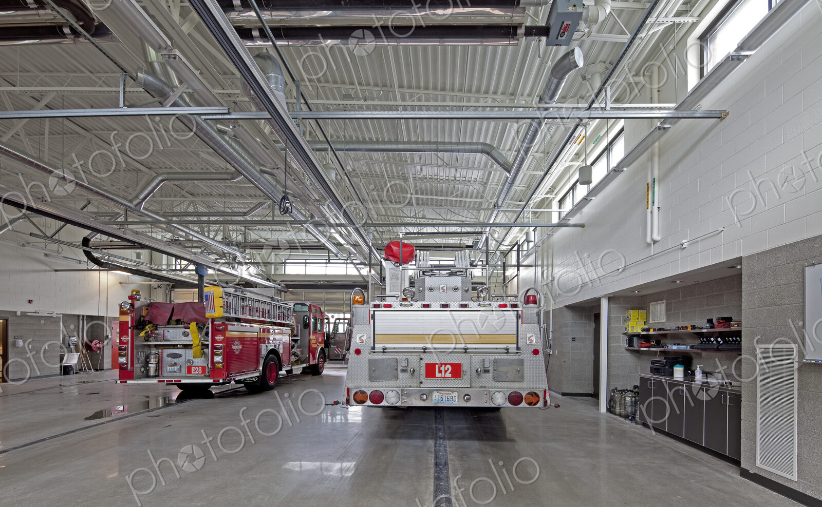 Fire Trucks in a Firehouse Bay
